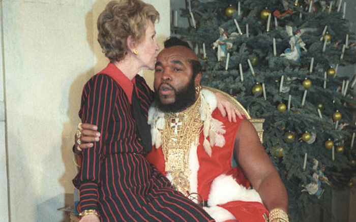 Nancy Reagan kisses Mr. T, 1983, Christmas